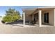 Covered patio with an outdoor dining area and a view of the low-maintenance backyard at 24822 S Sedona Dr, Sun Lakes, AZ 85248