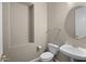 Powder room with sink, and toilet at 28604 N 92Nd Pl, Scottsdale, AZ 85262
