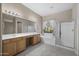 Expansive primary bathroom with double sink vanity, tub, and walk-in shower at 28604 N 92Nd Pl, Scottsdale, AZ 85262