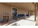 Covered patio with outdoor furniture, offering a relaxing outdoor space at 36249 N 7Th St, Phoenix, AZ 85086