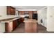 Well-equipped kitchen featuring a center island, stainless appliances and ample cabinets at 4003 S Mill Ave, Tempe, AZ 85282