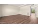 Bright and airy living room with hardwood floors, ready for personalization at 4003 S Mill Ave, Tempe, AZ 85282