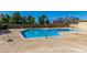 Inviting community pool with bright blue water and plenty of lounging space on a sunny day at 4003 S Mill Ave, Tempe, AZ 85282