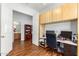 Office area includes a large desk, cabinets and is located near the bathroom at 4245 E Maya Way, Cave Creek, AZ 85331