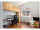 Home office features built-in cabinets, a desk, and a comfortable office chair at 4245 E Maya Way, Cave Creek, AZ 85331