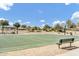 Community recreation area has shaded picnic tables and a basketball court for healthy activity and relaxation at 4304 E Whitehall Dr, San Tan Valley, AZ 85140