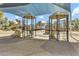 Well-maintained playground with sun shade, bridges, slides, and ladders creates fun opportunities for community youth at 4304 E Whitehall Dr, San Tan Valley, AZ 85140