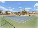 Tennis court with fence and landscaping for an active outdoor lifestyle in this well-maintained community at 4304 E Whitehall Dr, San Tan Valley, AZ 85140