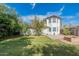 Home exterior with spacious yard, fire pit, and mature landscaping at 505 W Howe St, Tempe, AZ 85281