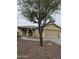 Charming single-story home with desert landscaping, a covered entryway and attached two-car garage at 5501 S Dove Crk Crk, Buckeye, AZ 85326