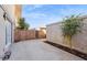 This spacious backyard features a cement patio and privacy from brick walls and fences at 6173 N Granite Reef Rd, Scottsdale, AZ 85250