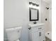 Bathroom with walk-in shower, modern vanity, and lighting fixtures at 6173 N Granite Reef Rd, Scottsdale, AZ 85250