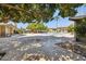 Relaxing community pool area, shaded seating, and lush landscaping creates an inviting oasis at 6173 N Granite Reef Rd, Scottsdale, AZ 85250