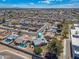 Aerial view of home in residential neighborhood, featuring backyard pool at 646 W Yale Dr, Tempe, AZ 85283