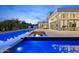 Luxurious modern home with a pool and a fire pit, perfect for enjoying evenings in style at 6601 E San Miguel Ave, Paradise Valley, AZ 85253