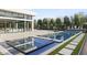 Backyard pool with modern tilework, greenery, and expansive outdoor area at 6601 E San Miguel Ave, Paradise Valley, AZ 85253