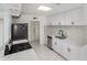 A bright kitchen boasts new countertops, stainless steel appliances, and updated cabinets and hardware at 6767 N 7Th St # 212, Phoenix, AZ 85014