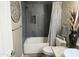 Nicely tiled bathroom with a shower-tub combo and granite-topped vanity at 7021 E Earll Dr # 223, Scottsdale, AZ 85251