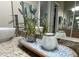 Bathroom with granite countertop, contemporary faucet, decorative tray and decor at 7021 E Earll Dr # 223, Scottsdale, AZ 85251