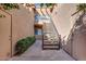 A charming courtyard with a staircase, offering a private outdoor space for relaxation and enjoyment at 7021 E Earll Dr # 223, Scottsdale, AZ 85251