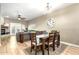 Open dining area with wood table, with a ceiling fan above at 7021 E Earll Dr # 223, Scottsdale, AZ 85251