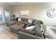 Comfortable living room with sectional sofa and view of the dining area at 7021 E Earll Dr # 223, Scottsdale, AZ 85251