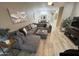 Open-concept living room with view to dining area, and modern furnishings at 7021 E Earll Dr # 223, Scottsdale, AZ 85251