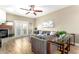 Inviting living room featuring modern furniture, ceiling fan, and fireplace at 7021 E Earll Dr # 223, Scottsdale, AZ 85251