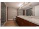 Modern bathroom featuring double sinks, marble countertops, and a glass-enclosed shower with detailed tile work at 7157 E Rancho Vista Dr # 5003, Scottsdale, AZ 85251