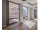 Bright room featuring hardwood floors, large windows, and modern architectural details at 7157 E Rancho Vista Dr # 5003, Scottsdale, AZ 85251