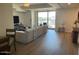 Spacious open-concept living area with wood flooring and abundant natural light at 7157 E Rancho Vista Dr # 5003, Scottsdale, AZ 85251