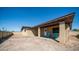 Spacious backyard featuring an outdoor patio and mature landscaping under a clear blue sky at 7928 N 46Th Ave, Glendale, AZ 85301