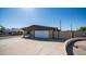 Charming single-story home boasts a wide driveway, a two-car garage and gated car port at 7928 N 46Th Ave, Glendale, AZ 85301