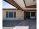 Inviting home exterior featuring brick facade, covered front porch, and well-maintained landscaping at 7928 N 46Th Ave, Glendale, AZ 85301