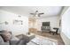 Comfortable living room featuring a plush sofa, stylish decor, and plenty of natural light at 7928 N 46Th Ave, Glendale, AZ 85301