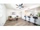 Cozy living room featuring modern furniture, a ceiling fan, and ample natural light at 7928 N 46Th Ave, Glendale, AZ 85301