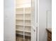 Well-organized pantry with ample shelving space for storage and kitchen organization at 7928 N 46Th Ave, Glendale, AZ 85301