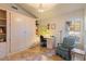 Home office with a comfortable chair, built-in desk, tiled floors, and great natural light at 804 N Jamaica Way, Gilbert, AZ 85234