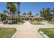 Grand estate with lush landscaping, a circular driveway, and impressive architectural details at 804 N Jamaica Way, Gilbert, AZ 85234