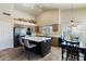 Spacious kitchen boasts ample cabinet space, a center island, and a cozy breakfast nook at 804 N Jamaica Way, Gilbert, AZ 85234