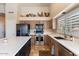 Well-appointed kitchen featuring stainless steel appliances, granite countertops, and ample cabinet space at 804 N Jamaica Way, Gilbert, AZ 85234