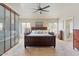 The main bedroom has plenty of closet space, natural lighting, and neutral paint colors at 804 N Jamaica Way, Gilbert, AZ 85234
