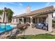 Outdoor living space featuring a covered patio with a pool view, perfect for entertaining guests at 804 N Jamaica Way, Gilbert, AZ 85234