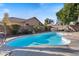 Inviting backyard pool, complemented by a nearby spa and lush landscaping for serene outdoor living at 804 N Jamaica Way, Gilbert, AZ 85234