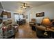 Cozy living room featuring vaulted ceilings, neutral tones, and comfortable seating arrangements, creating a welcoming ambiance at 8700 E University Dr # 1024, Mesa, AZ 85207