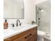 Elegant bathroom with a marble countertop, modern fixtures, and a glass-enclosed shower at 8732 E Forest Dr, Scottsdale, AZ 85257