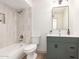 Bathroom featuring modern design with stylish vanity, and a shower-tub combination at 8732 E Forest Dr, Scottsdale, AZ 85257