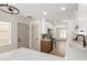 Bright kitchen features stainless steel appliances, modern finishes, and ample counter space at 8732 E Forest Dr, Scottsdale, AZ 85257
