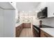 Well-equipped kitchen with stainless steel appliances and stylish cabinetry at 8732 E Forest Dr, Scottsdale, AZ 85257