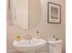 Bright bathroom with an oval mirror, modern sink, and neutral wall decor at 8911 S 14Th Way, Phoenix, AZ 85042
